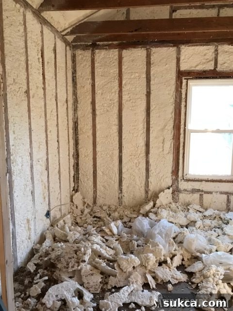 Trimming off excess of Spray foam insulation Trimming excess spray foam insulation for a flush finish