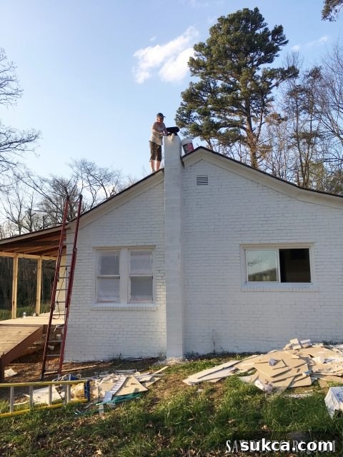 Chimney painting after two coats for a complete exterior look
