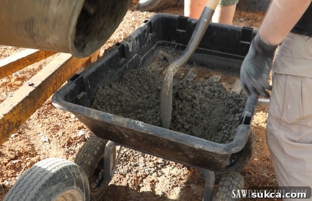 Foundation Concrete Installation for Deck Pouring Concrete into Deck Footing Holes