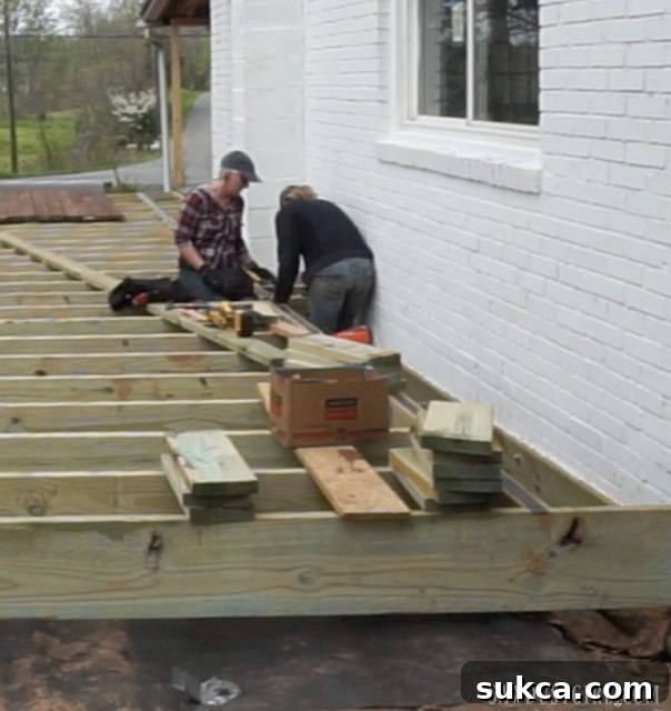 Detailed view of the deck joist installation, showing precise measurements and construction.
