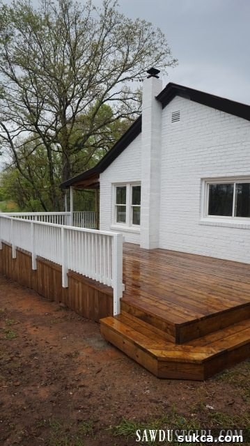 The finished Calderwood Cottage deck, ready for use, showcasing its robust construction.