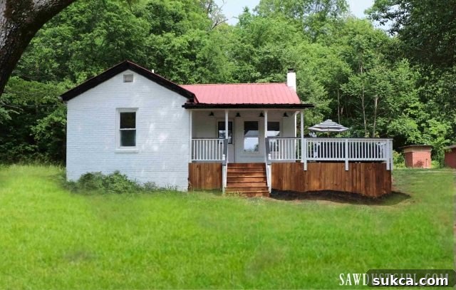 Calderwood Cottage with its impressive new deck, showcasing the dramatic enhancement to the home's exterior.
