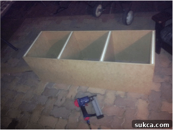 Kristy building the precision drawer box foundation for the custom built-in bed frame - SawdustGirl.com