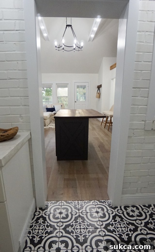 Exposed brick wall feature in the renovated laundry room
