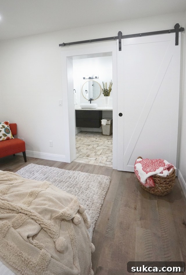 Close-up of the elegant white barn door in the master bedroom