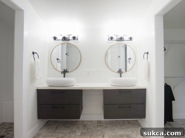 Another perspective of the bright and functional master bathroom in Calderwood Cottage