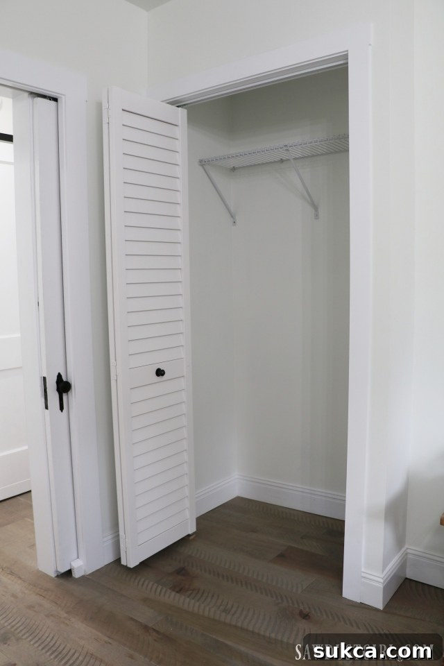 Bedroom closet doors featuring industrial-style knobs and a unique pocket door design