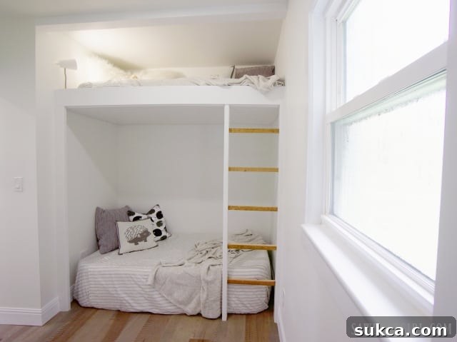 Custom-built ladder providing access to the upper bunk bed