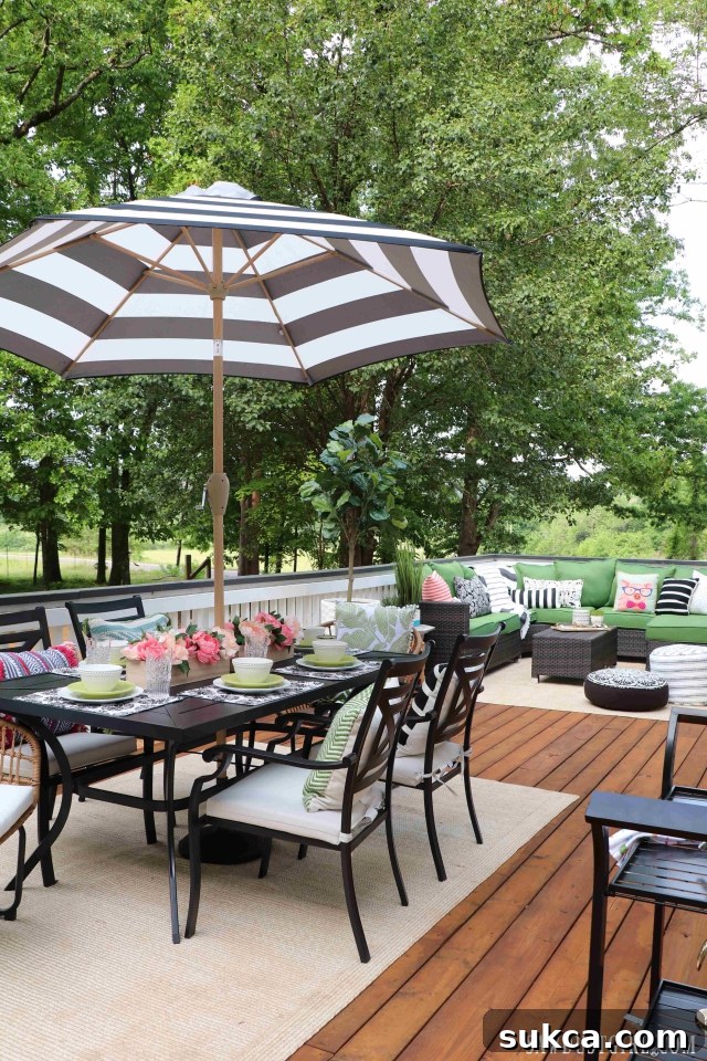 Spacious furnished wooden deck, perfect for outdoor entertainment and relaxation