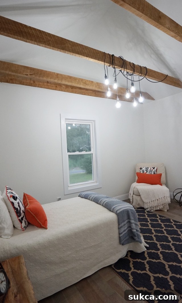 Close-up of vintage light sockets elegantly wrapped around an exposed beam