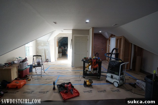 Beginning of the loft transformation Loft space before renovation showing clutter and disorganization