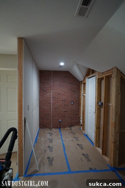 Finished brick panel wall segment Completed section of faux brick panel wall