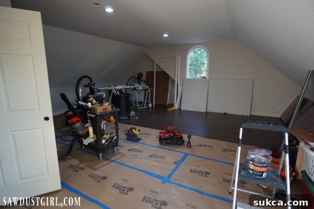 Protected new flooring in the loft Cardboard protecting the new loft floors during ongoing work