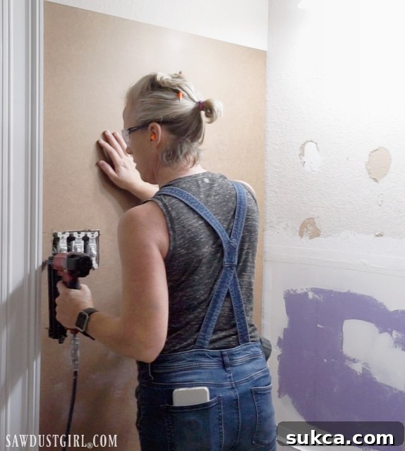 Installing 1/8 inch tempered hardboard for a smooth wainscoting base