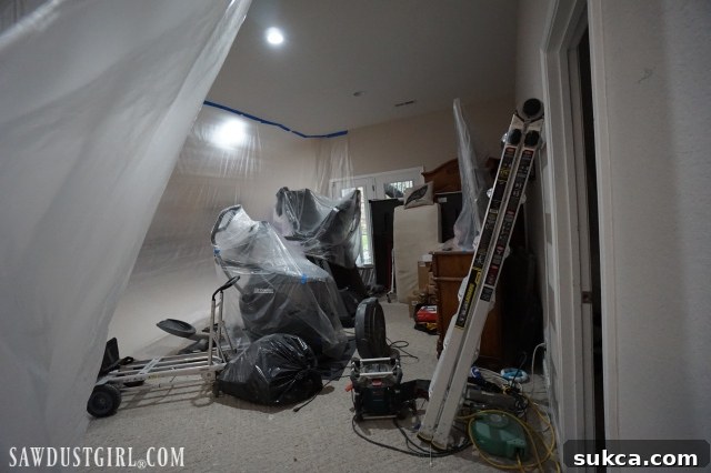 Basement pre-drywall showing organized belongings
