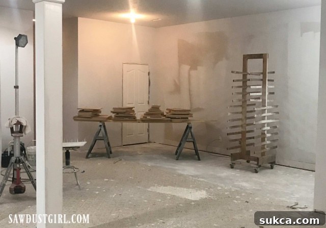 Spraying kitchen cabinet doors in a makeshift paint booth