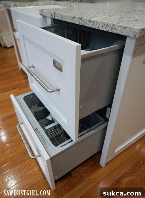 Double Drawer Dishwasher Integrated A double-drawer dishwasher unit with custom integrated panels, showcasing its seamless integration into the kitchen.