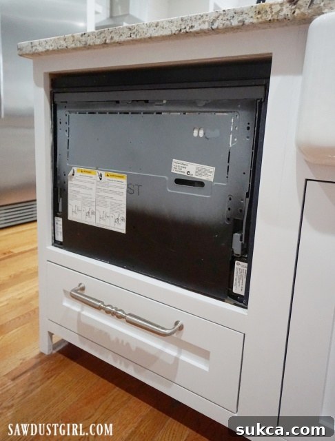 Dishwasher Drawer Before Panel Installation Dishwasher drawer without an integrated custom panel, showing the exposed appliance front.