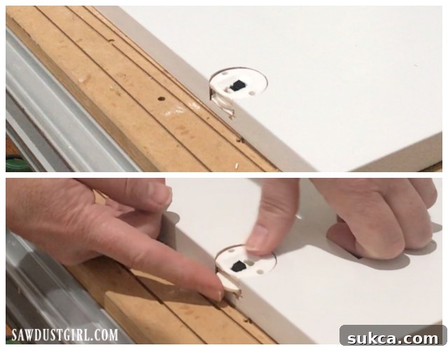 Detailed image showcasing adjustable glides for sliding cabinet doors, highlighting their design for easy installation and precise positioning.