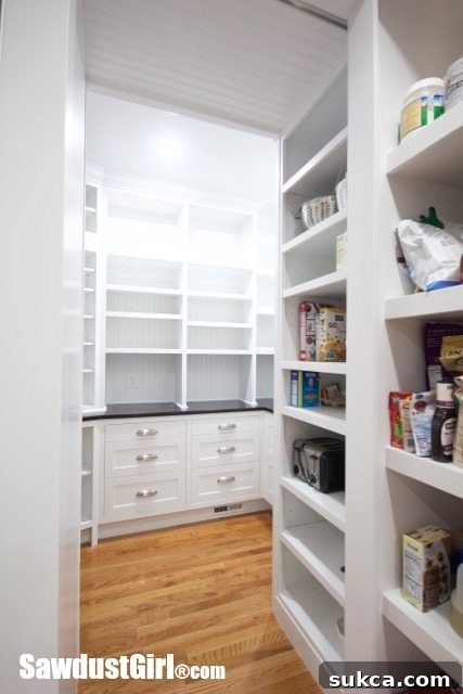 Spacious and organized walk-in pantry, a hidden gem in the kitchen design.