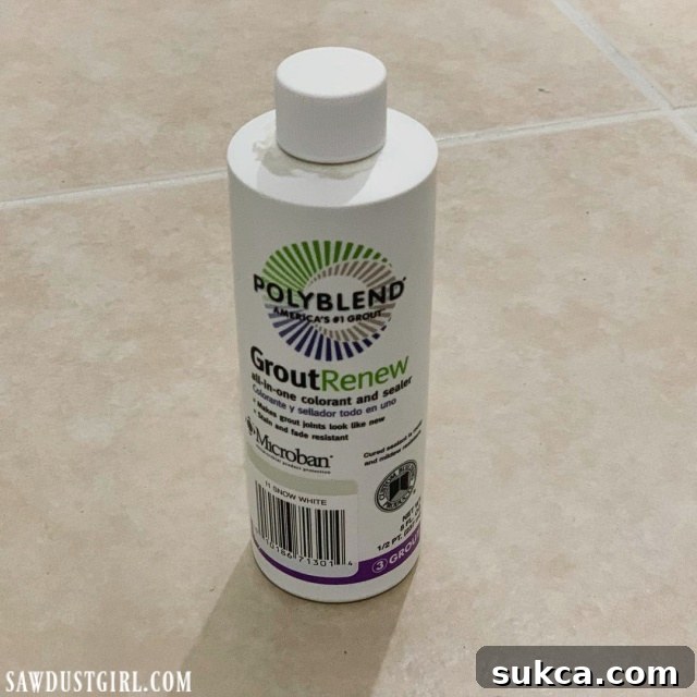 a bottle of grout renew on a tile floor that just had the grout color changed with grout paint