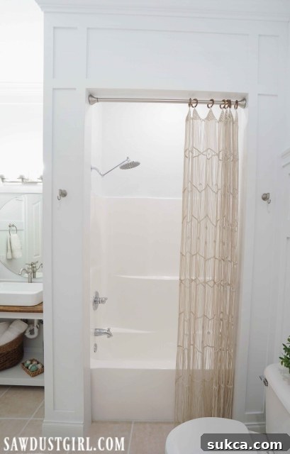 Elegant Macrame Shower Curtain in Renovated Bathroom