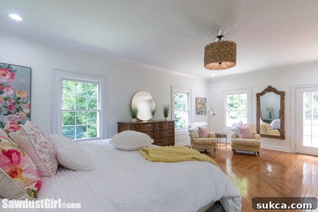 Serene master bedroom decor with neutral tones and cozy furnishings, creating a relaxing ambiance for ultimate comfort
