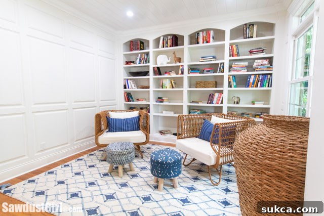 A beautifully decorated library space showcasing the transformative power of trim and paint, creating a refined atmosphere.