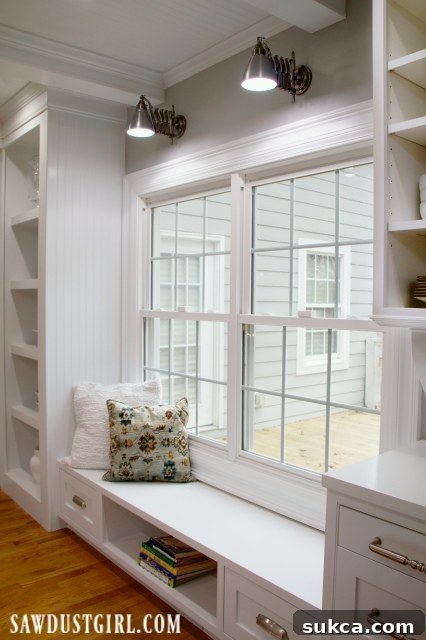 Cozy window seat in the kitchen, offering a comfortable spot for casual dining or reading.