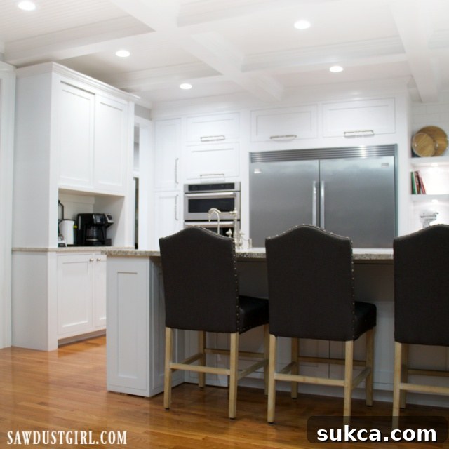 Complete kitchen renovation with sparkling white cabinets and modern farmhouse appeal.