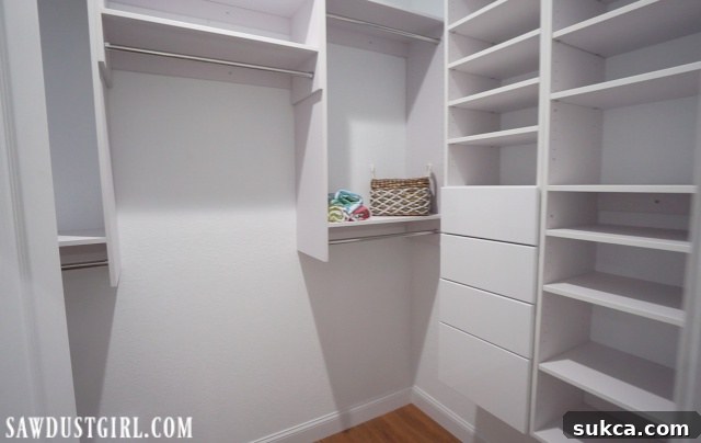 Modern modular closet organizer installed in the basement bedroom