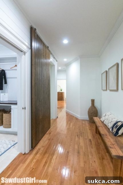 Hallway with new pocket doors and modern decor