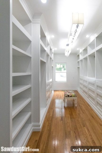 Custom Built-in Walk-in Closet Custom built-in walk-in closet cabinets with ample storage