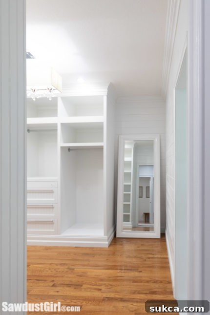 Organized Walk-in Closet Large walk-in closet with custom cabinetry and organized sections