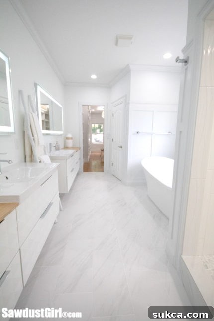 white and bamboo master bathroom