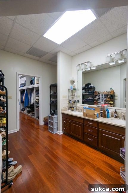 Dressing room with an unusually low vanity Low double vanity in the dressing room, showcasing an unusual height