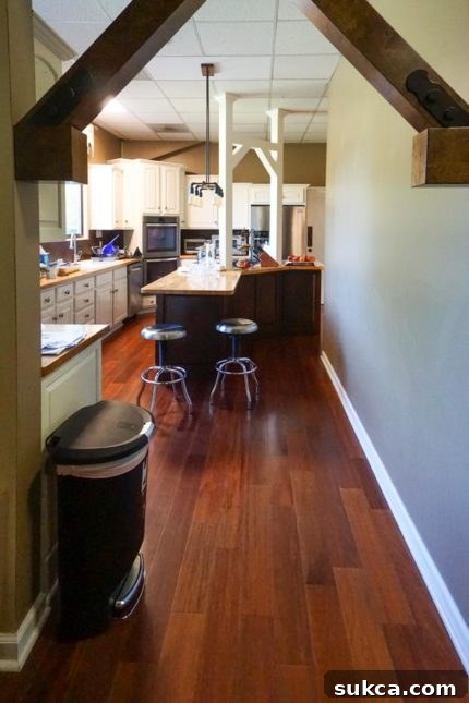 Beware the kitchen beam Awkward decorative beam at the kitchen exit, a potential head-hazard