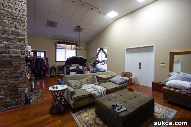 Living/Dining Room: A work in progress Cluttered living and dining area in the Clinton house