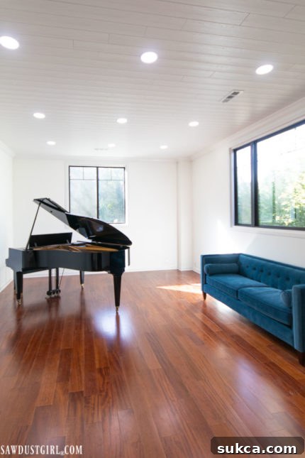 A stunning view of the beautiful plank ceilings, successfully hiding the unsightly suspended ceiling grid and enhancing the room's beauty.