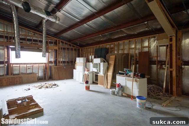 Another perspective of the open upstairs area, highlighting the natural light and the scale of the future common spaces.