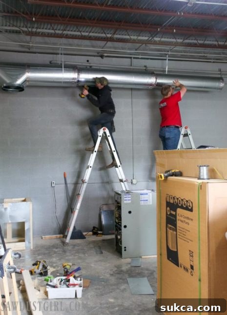 Main HVAC trunkline running along the workshop wall