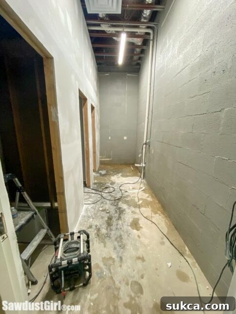 Interior view of the workshop restroom under construction.