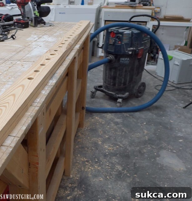 Close-up of the drilled holes on the ladder legs, showing alignment