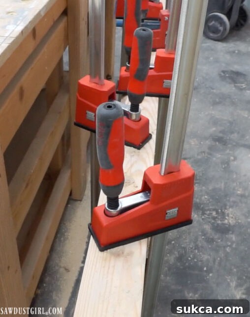 The second ladder leg being fitted onto the dowels