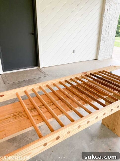 The finished shoe ladder after the clear coat has dried, showcasing its natural wood