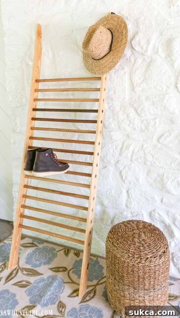 Various shoes and boots neatly displayed on the vertical storage ladder