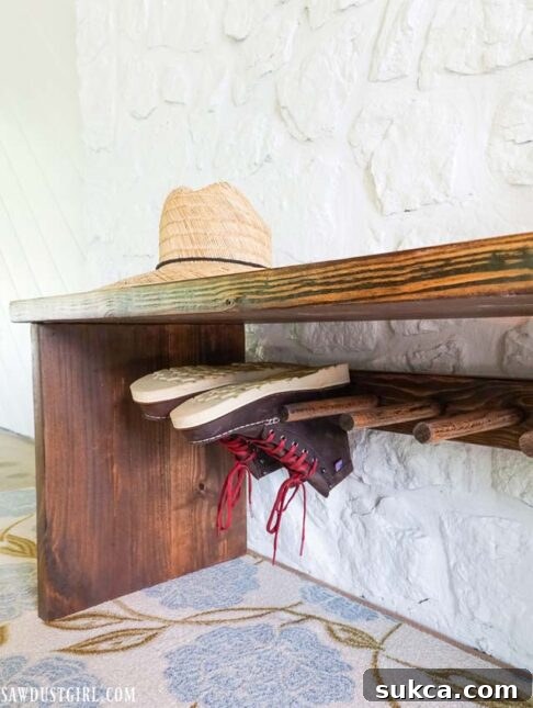 Craft Your Own Bench with Integrated Boot Storage 31 Front view of the custom boot storage bench with shoes