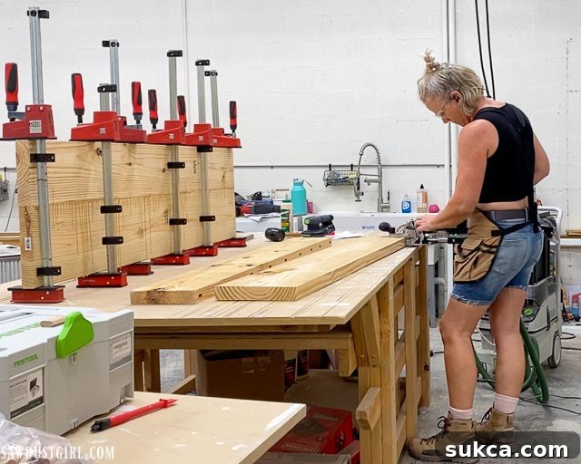 Craft Your Own Bench with Integrated Boot Storage 10 Two wide laminated wood planks ready for bench construction