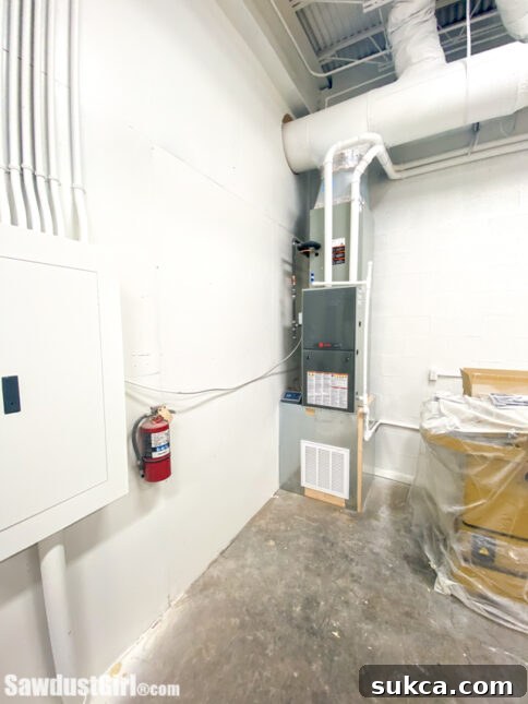 Workshop HVAC System View Another perspective of the Trane HVAC system's indoor components within the workshop, emphasizing a professional installation.