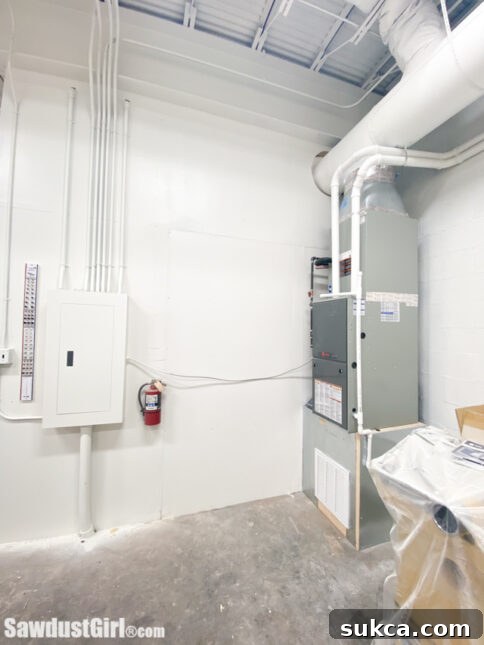 Trane HVAC Unit in Workshop An HVAC unit visible in a workshop, symbolizing advanced climate control and energy efficiency for a comfortable workspace.